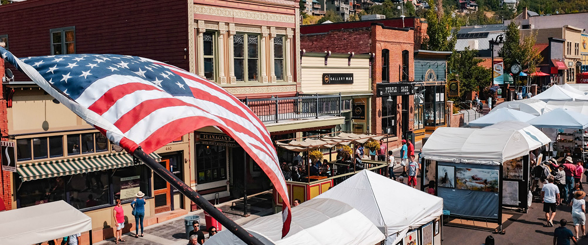 flag, buildings, vendors